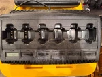 2 Motorola Impres NNTN7064B 6-BANK Charger With Display For Apx Used. Price: $399.00.