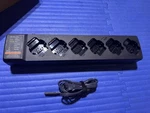 Motorola PMPN4588A 6-WAY Charger For Curve Series 2-WAY Radios Used. Price: $100.00.