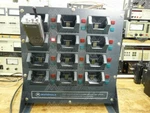 Motorola NLN6898B 12 Slot Rapid Charger, HT220 Omni Used. Price: $575.00.