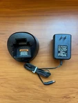 Motorola Radius PMTN4086A Charger W/ Power Supply Used. Price: $28.00.