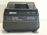 Macom Rapid Charger Tri-chemistry Used. Price: $6.00.