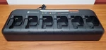 Original Motorola NNTN8410A 6 Pack Rapid Charger For CP200, CP200D And R2 Radios Used. Price: $295.00.