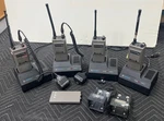 4 Motorola HT50 Portable Radio W/ Base Station Charger & Mics 2 New Batteries Used. Price: $375.00.