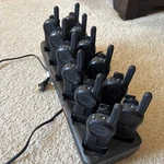 Motorola PMLN7135A Way Radio Walkies Talkies With Charging Dock Lot Of 12 Used. Price: $700.00.