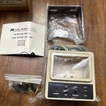 New Old Stock Midland Mobile Radio Battery Charger 70-C13 Unused Open. Price: $60.00.