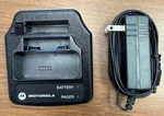 Motorola RLN5703, Minitor V Pager Drop Charger W/ Spare Battery Slot (used). Price: $15.00.