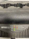 Motorola NNTN7064B Impres Dock Rack Multi-unit Adaptive Two-way Radio Charger Used. Price: $99.00.